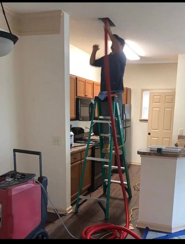 HomePros Pro performing full HVAC service and air duct inspection in Katy TX home